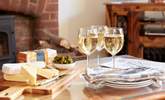 Enjoy a glass of wine and some local cheese after a day out visiting the island. - Thumbnail Image