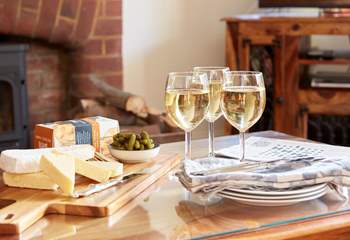 Enjoy a glass of wine and some local cheese after a day out visiting the island.