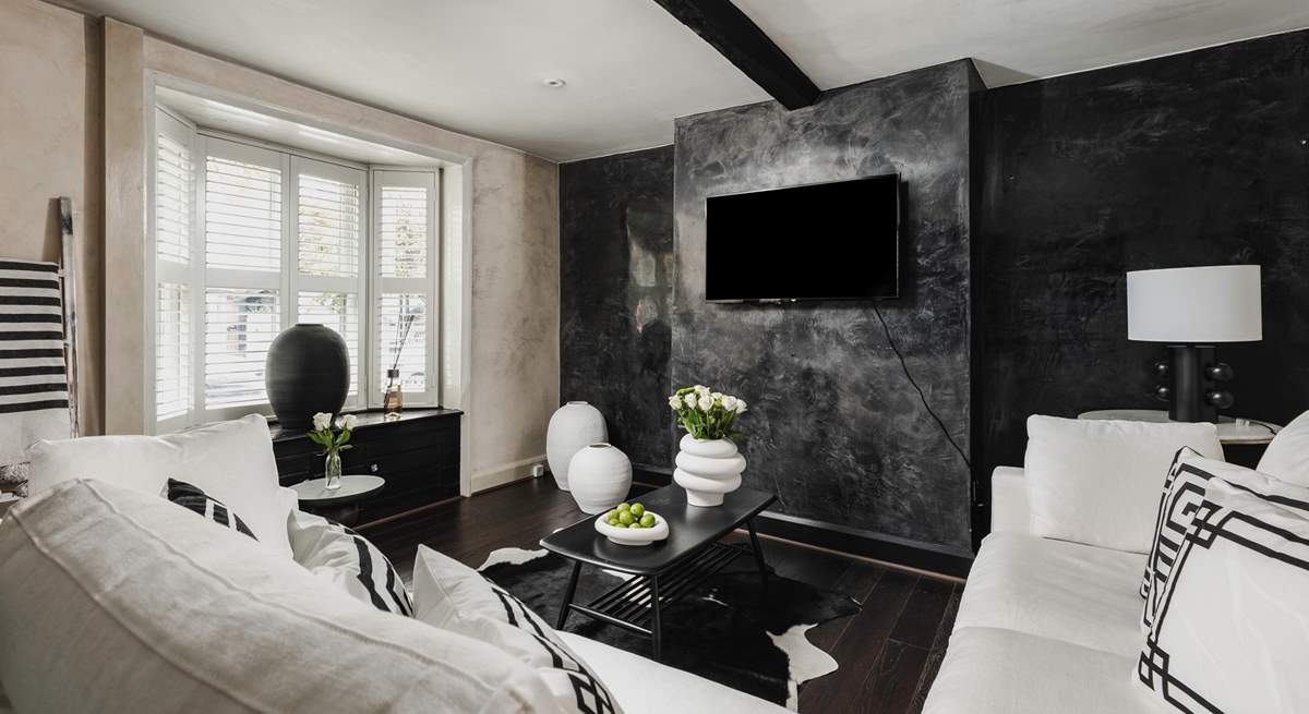 The stylish sitting-room with its striking monochrome design.