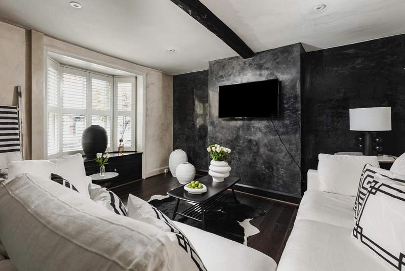 The stylish sitting-room with its striking monochrome design.