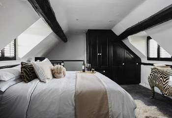 The main bedroom with original medieval beams.