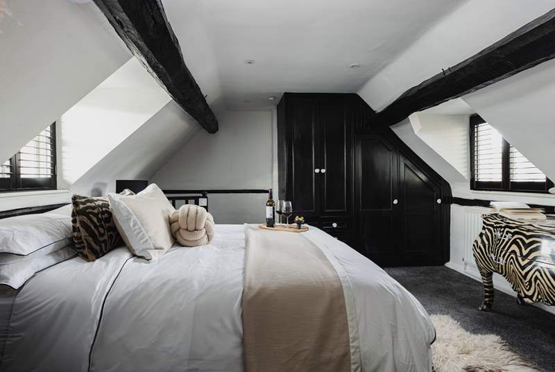 The main bedroom with original medieval beams.