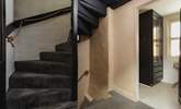 Stairs leading up to the second floor. - Thumbnail Image