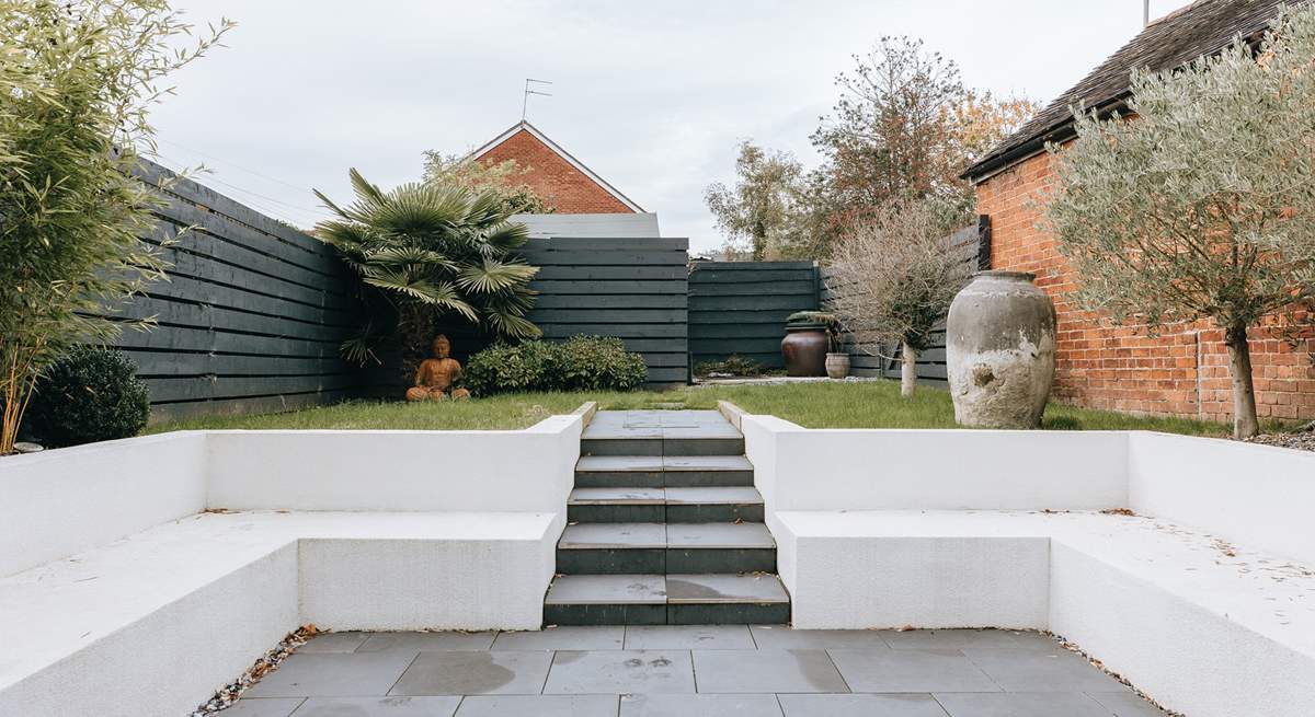 The enclosed garden has plenty of seating space.