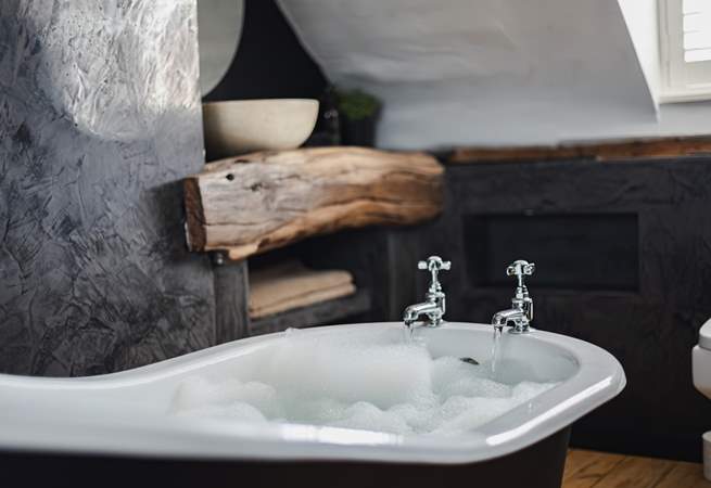Pamper yourself with a soak in the beautiful roll-top bath...you'd be forgiven for thinking you'd stepped into a luxurious spa.