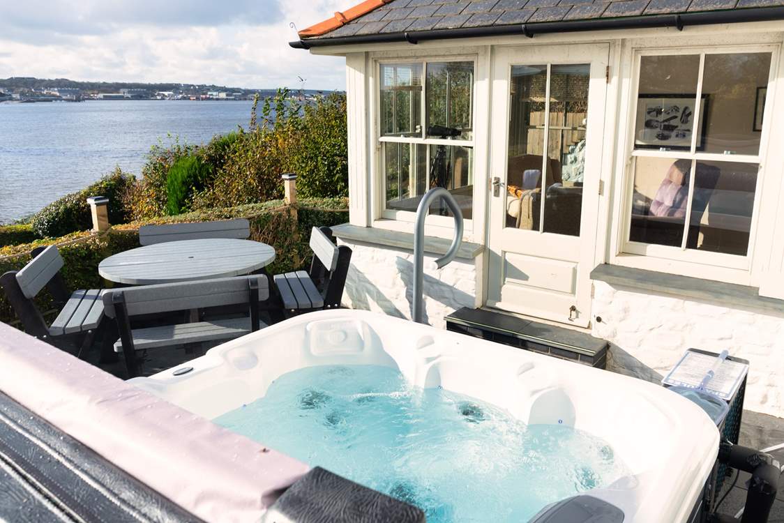Relax in the blissful hot tub and soak up the views.