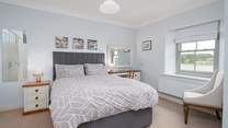 En suite double room with a waterway view. 