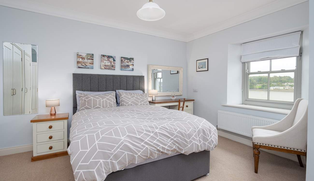 En suite double room with a waterway view. 