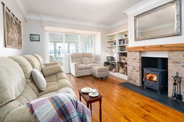 Relax in the glow of the fire together watching your favourite film.