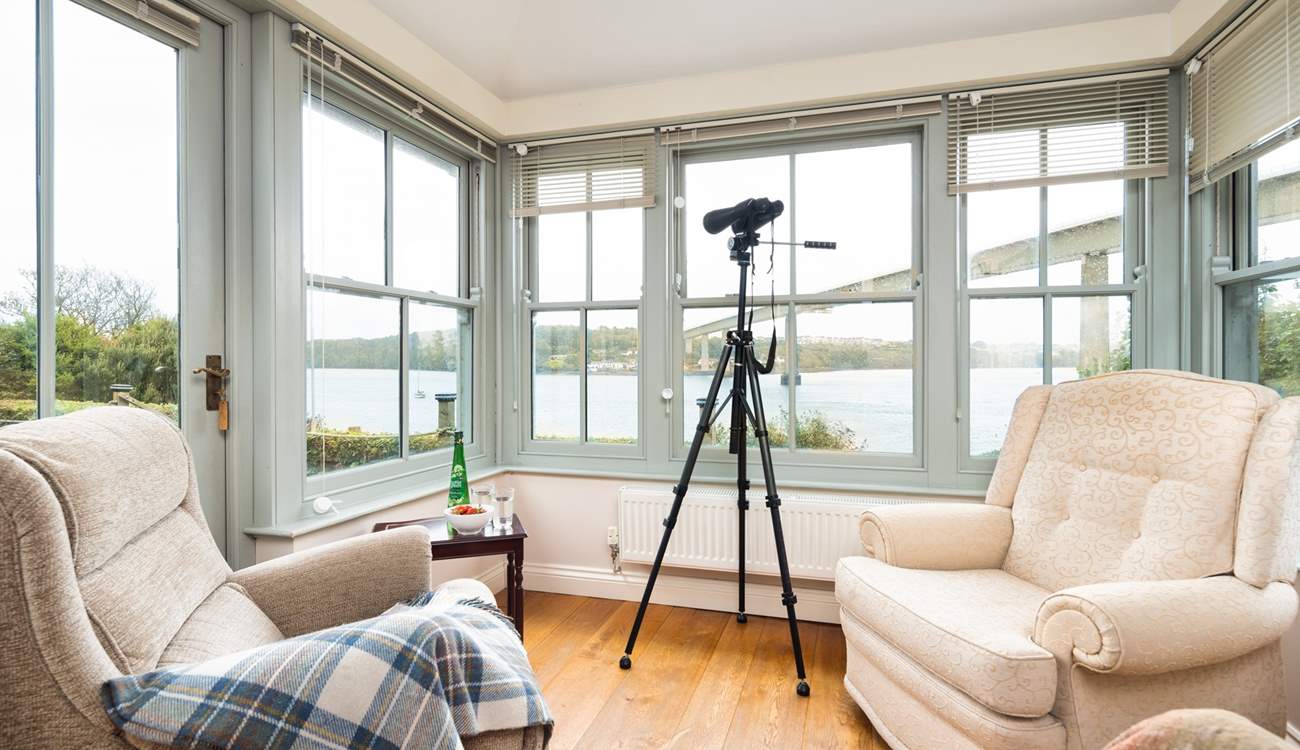 The sun-room is the perfect spot for watching the boats sail by. 