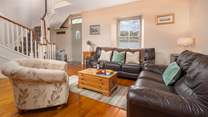 Look out at the stunning view from the open plan sitting/dining-room.