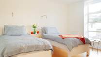 The first of two comfortable twin bedrooms facing the front of the house.