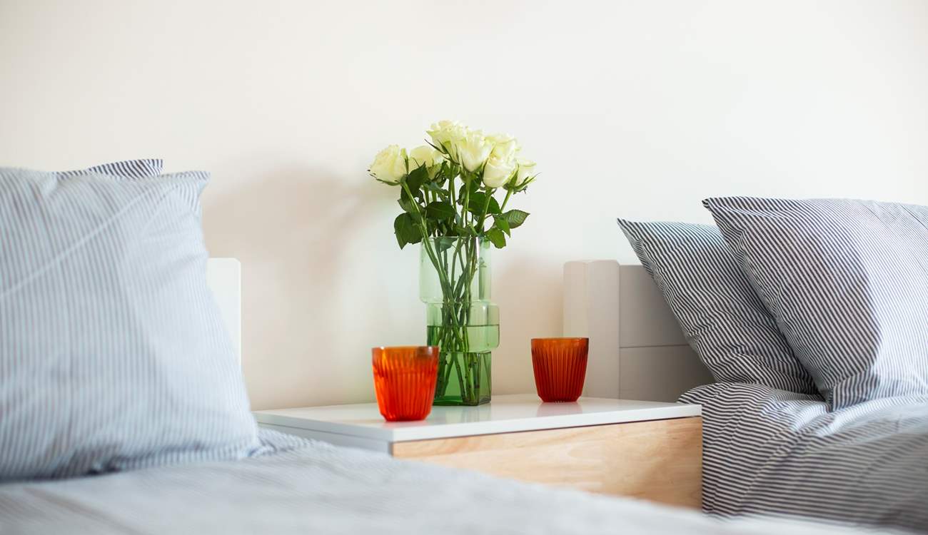 Fresh crisp sheets on the twin beds.