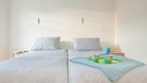 The second of two twin bedrooms facing the front of the house.