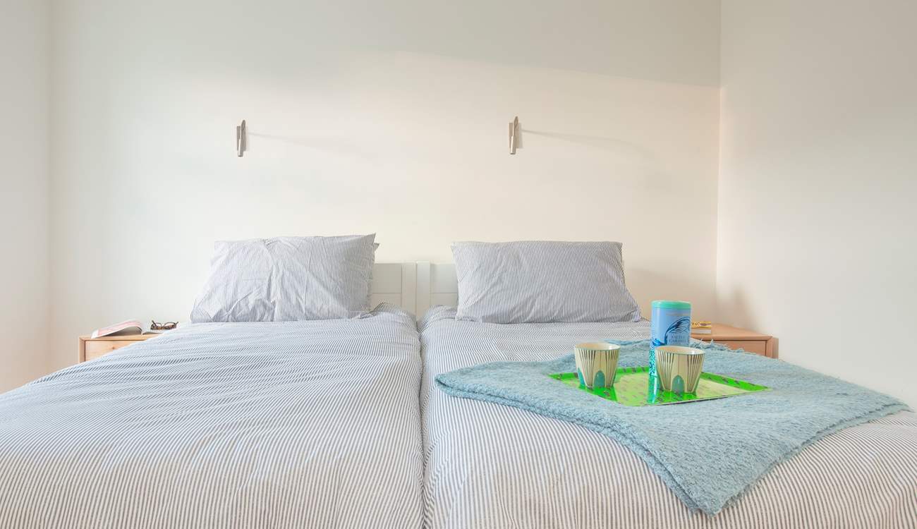 The second of two twin bedrooms facing the front of the house.