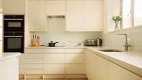 Sleek and modern design awaits the holiday chef in the kitchen.