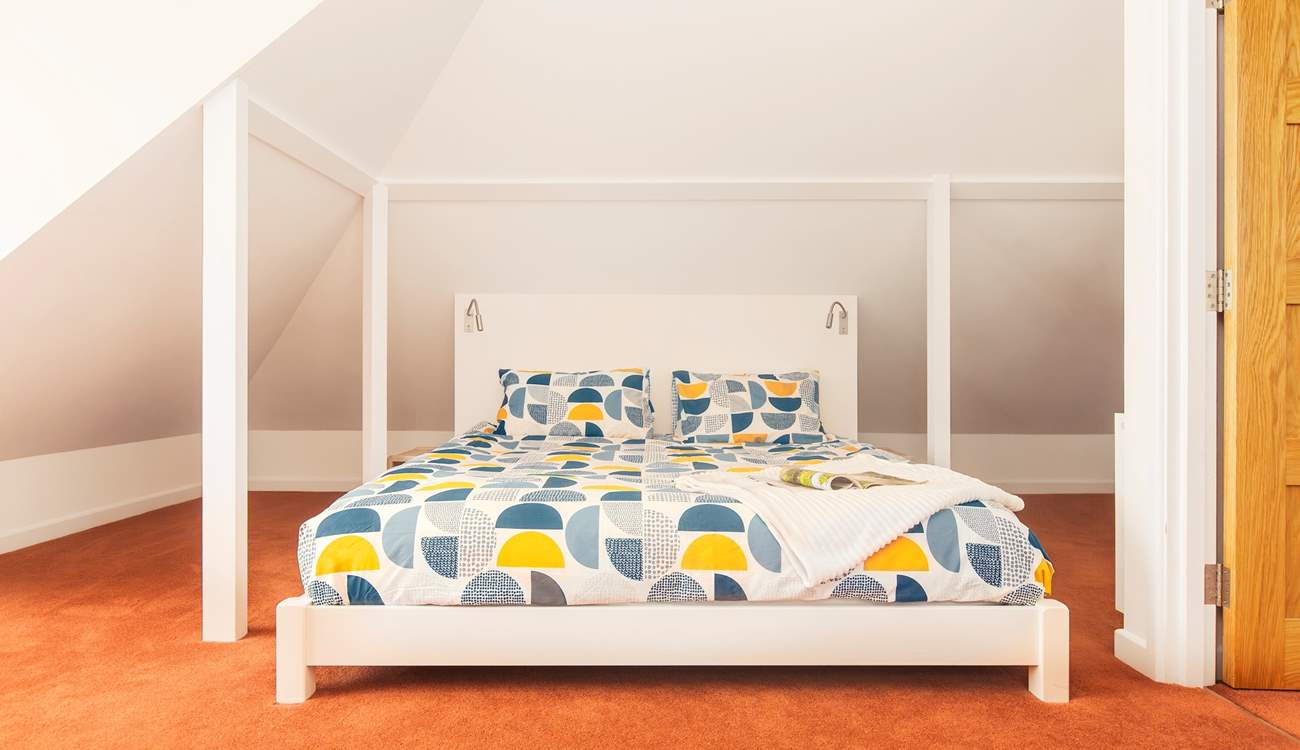 The super-king size bed in the main bedroom on the first floor.