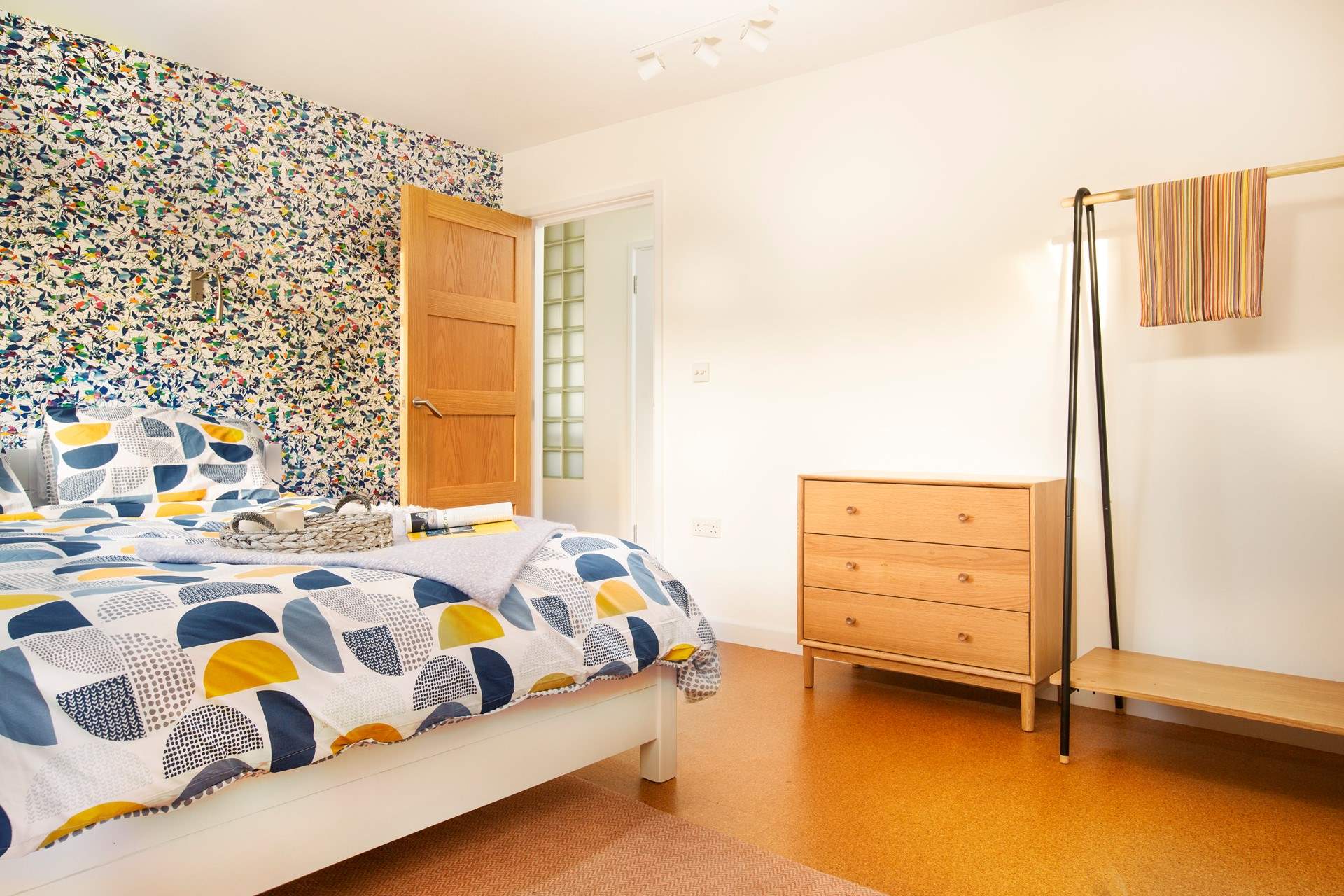 Bedroom three with a super-king bed and en suite shower-room.