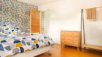 Bedroom three with a super-king bed and en suite shower-room.