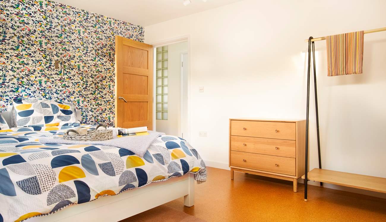 Bedroom three with a super-king bed and en suite shower-room.