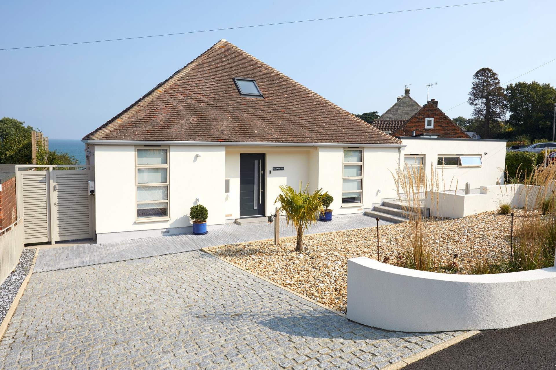 One of two driveways in front of the house. This is the left-hand side driveway.