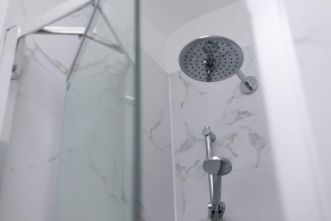 Modern drench head shower.