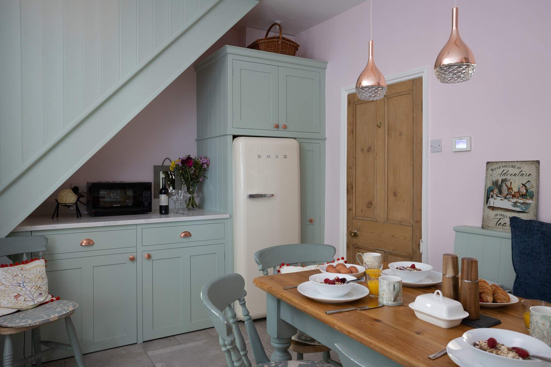 The farmhouse table is perfect for sharing a meal.