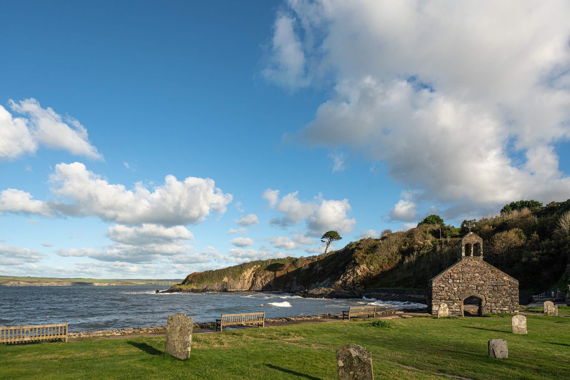 Walk to Cwm yr Eglws at low tide or follow the coast path, a sheltered cove with a sandy beach and rock pools. What remains of St. Brynach's Church after the Great Storm still stand on the beach front. 