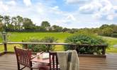 There's an idyllic decking area to the front of the house. A peaceful spot for a cup of tea and your favourite book. - Thumbnail Image