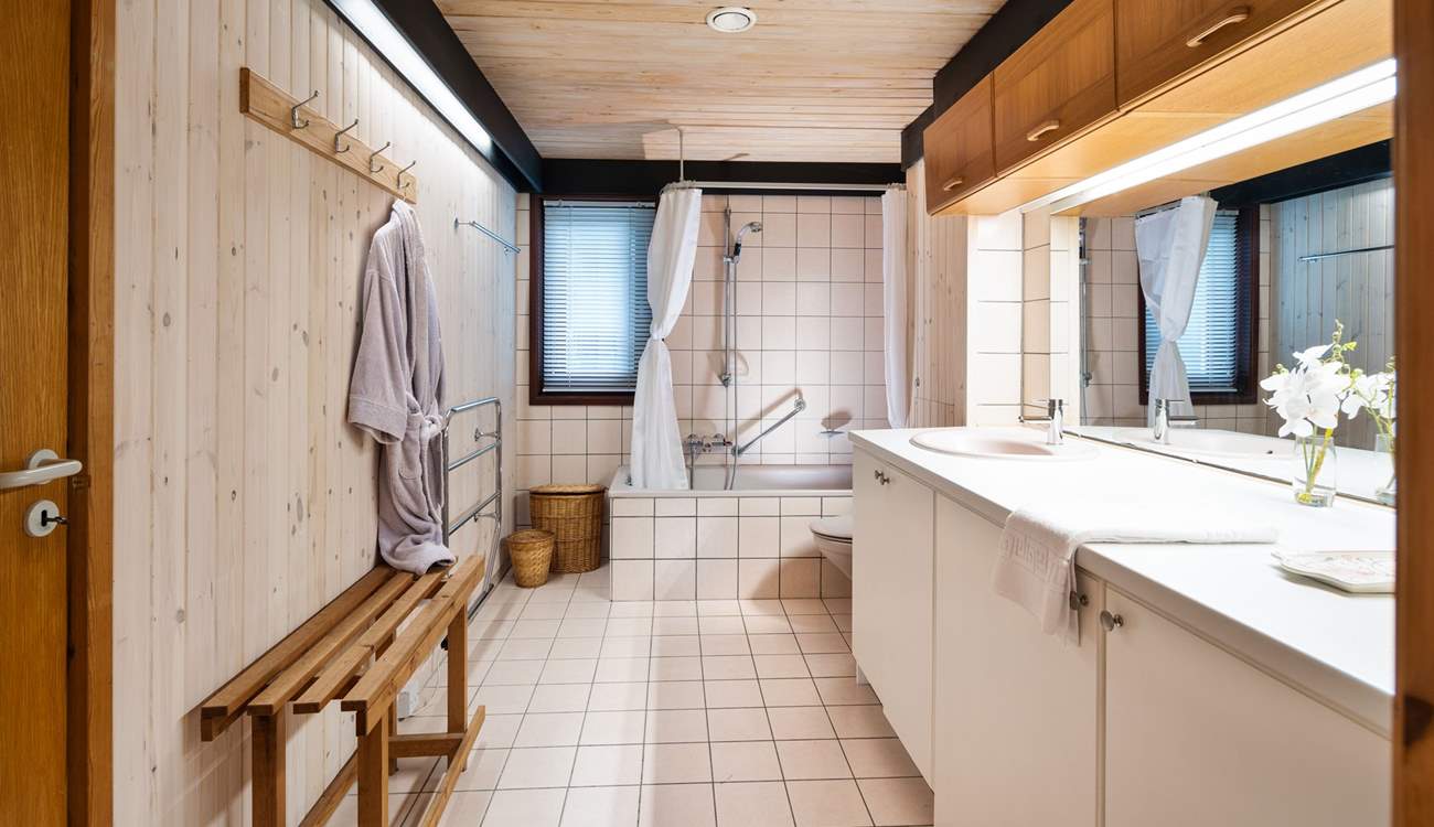 The en suite ground floor bathroom is also accessed from the hallway. 