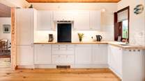 The large, airy kitchen has all the holiday chef needs. 