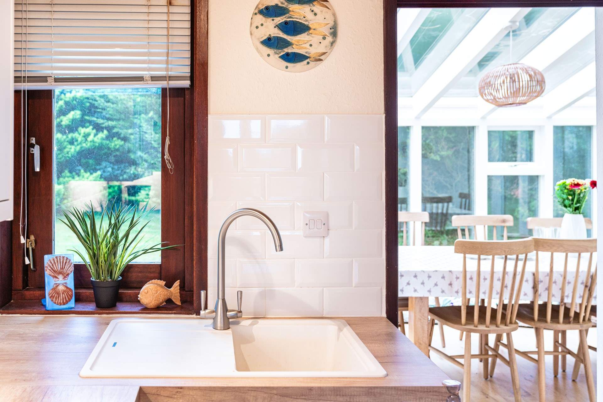 Just off the kitchen is the delightful sun-room.