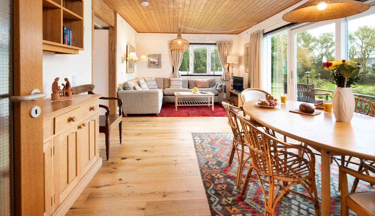 Commanding an enchanting position with sea views, the versatile accommodation sleeps eight over two floors. 