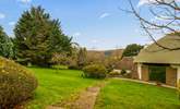 Step out of your front door with swimmers in hand and head over to your enclosed pool area (you can see a glimpse of the pool just left of the image through the hedge surround). - Thumbnail Image