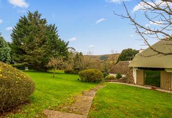 Step out of your front door with swimmers in hand and head over to your enclosed pool area (you can see a glimpse of the pool just left of the image through the hedge surround).