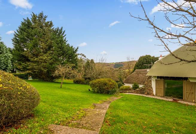 Step out of your front door with swimmers in hand and head over to your enclosed pool area (you can see a glimpse of the pool just left of the image through the hedge surround).