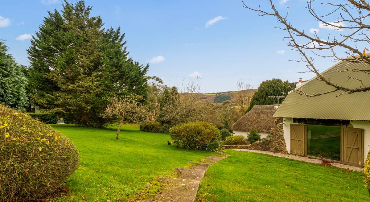 Step out of your front door with swimmers in hand and head over to your enclosed pool area (you can see a glimpse of the pool just left of the image through the hedge surround).