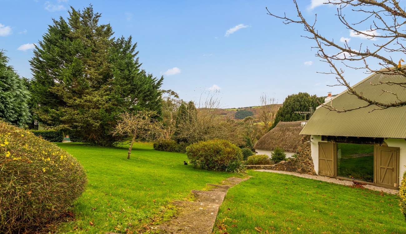 Step out of your front door with swimmers in hand and head over to your enclosed pool area (you can see a glimpse of the pool just left of the image through the hedge surround).