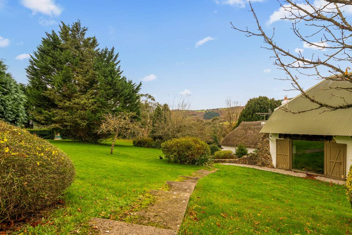 Step out of your front door with swimmers in hand and head over to your enclosed pool area (you can see a glimpse of the pool just left of the image through the hedge surround).