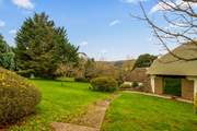 Step out of your front door with swimmers in hand and head over to your enclosed pool area (you can see a glimpse of the pool just left of the image through the hedge surround).