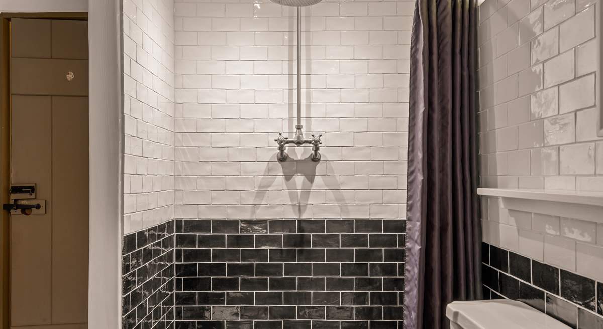 For those who prefer a shower, the family bathroom offers a beautiful shower space.