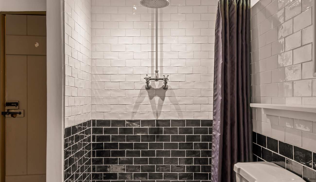 For those who prefer a shower, the family bathroom offers a beautiful shower space.