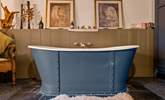 Jump out of bed, straight into your roll-top bath which sits proudly at the foot of your bed. - Thumbnail Image