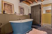 Bedroom one also has an en suite WC and wash-basin tucked away.