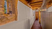 The ground floor corridor links the bedrooms and family bathroom.