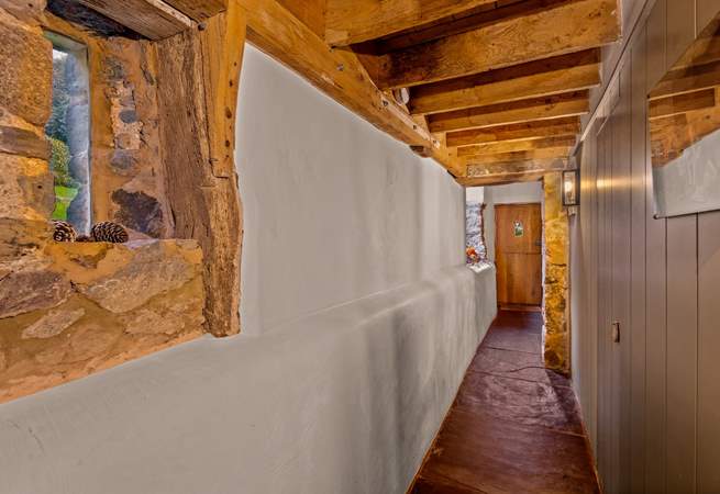 The ground floor corridor links the bedrooms and family bathroom.