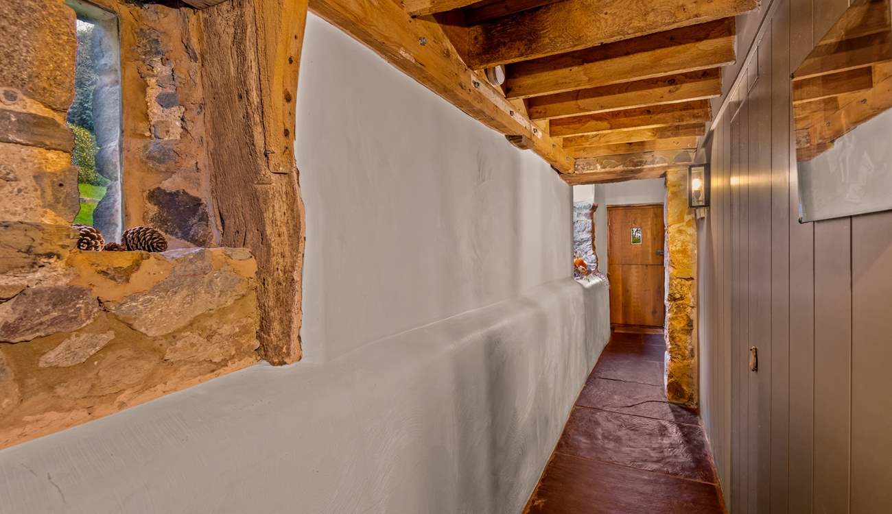 The ground floor corridor links the bedrooms and family bathroom.