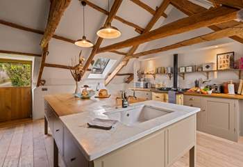 The stunning kitchen makes preparing any feast a pleasure.