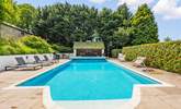 Your private heated pool and fire-pit area. Perfect for those sunny days and chillier evenings. - Thumbnail Image