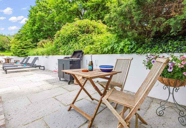 Spark up the barbecue whilst the water lovers enjoy the heated pool.